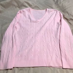 Pink long sleeve sweater.